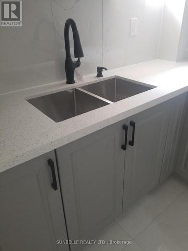 Bsmt - 12 Polstar Road, Brampton, ON - Indoor Photo Showing Kitchen With Double Sink