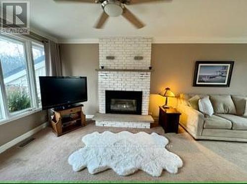 5576 Fawn Bay Road, Ramara, ON - Indoor Photo Showing Living Room With Fireplace