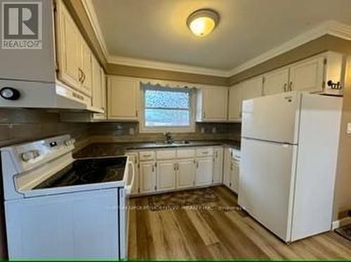 5576 Fawn Bay Road, Ramara, ON - Indoor Photo Showing Kitchen With Double Sink