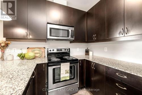 424 - 383 Main Street E, Milton, ON - Indoor Photo Showing Kitchen With Stainless Steel Kitchen With Upgraded Kitchen