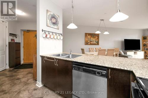 424 - 383 Main Street E, Milton, ON - Indoor Photo Showing Kitchen With Double Sink