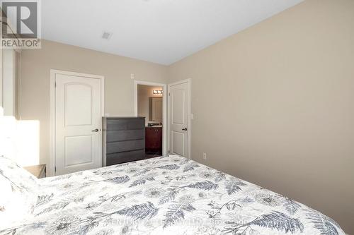 424 - 383 Main Street E, Milton, ON - Indoor Photo Showing Bedroom