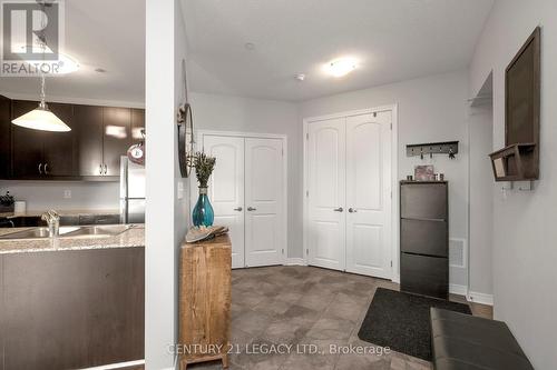 424 - 383 Main Street E, Milton, ON - Indoor Photo Showing Kitchen With Double Sink