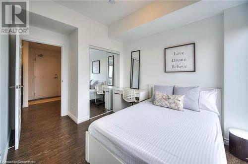 Bedroom featuring dark hardwood / wood-style floors and a closet - 160 King Street N Unit# 901, Waterloo, ON - Indoor Photo Showing Bedroom