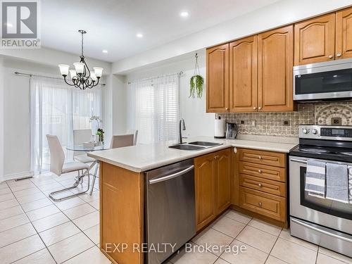 1051 Mcclenahan Crescent, Milton, ON - Indoor Photo Showing Kitchen With Double Sink