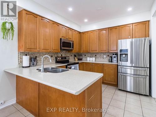 1051 Mcclenahan Crescent, Milton, ON - Indoor Photo Showing Kitchen With Stainless Steel Kitchen With Double Sink