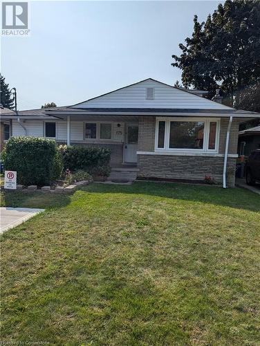 View of front of house featuring a front lawn - 175 Oxford Street Unit# A, Kitchener, ON - Outdoor