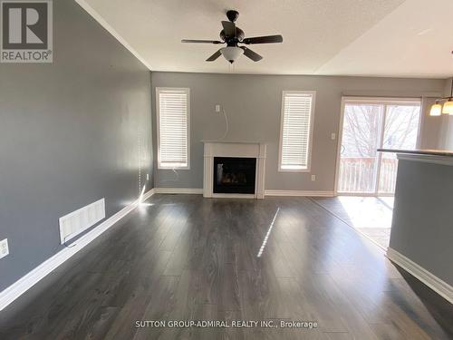 Main - 50 Maple Crown Terrace, Barrie, ON - Indoor Photo Showing Living Room With Fireplace