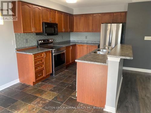 Main - 50 Maple Crown Terrace, Barrie, ON - Indoor Photo Showing Kitchen With Double Sink