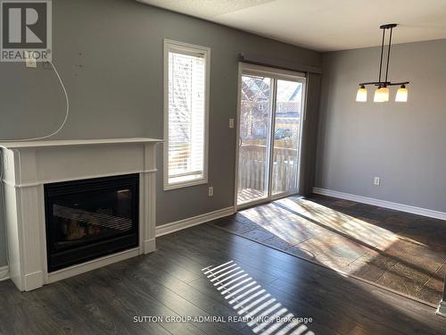 Main - 50 Maple Crown Terrace, Barrie, ON - Indoor Photo Showing Living Room With Fireplace