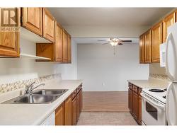 View from the front door through the kitchen towards the dining area - 