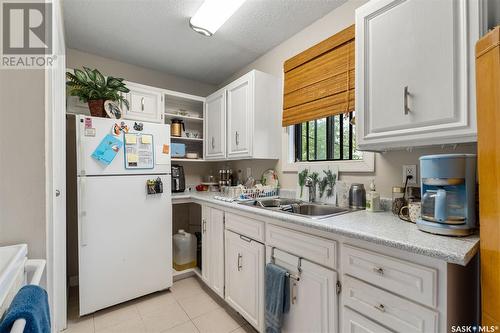 15A & 15B Erixon Place, Clavet, SK - Indoor Photo Showing Kitchen With Double Sink