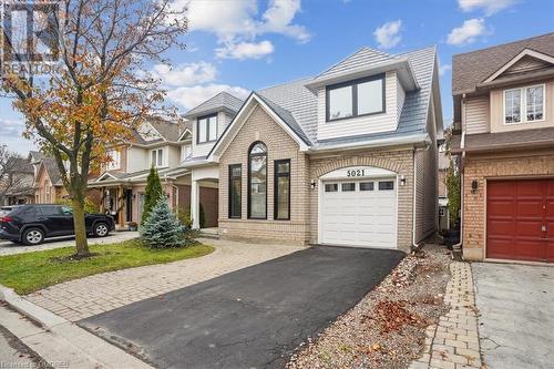 View of front of property featuring a garage - 5021 Bunton Crescent, Burlington, ON - Outdoor With Facade