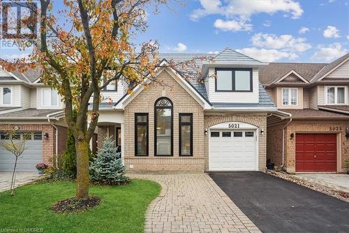 View of front of house featuring a garage - 5021 Bunton Crescent, Burlington, ON - Outdoor With Facade