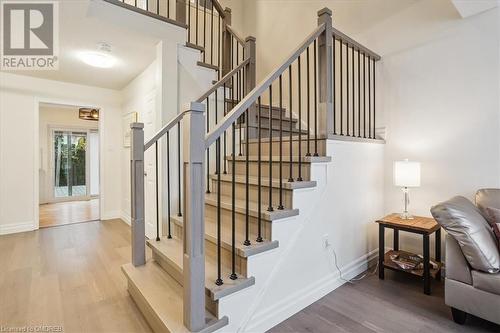 Staircase featuring hardwood / wood-style floors - 5021 Bunton Crescent, Burlington, ON - Indoor Photo Showing Other Room