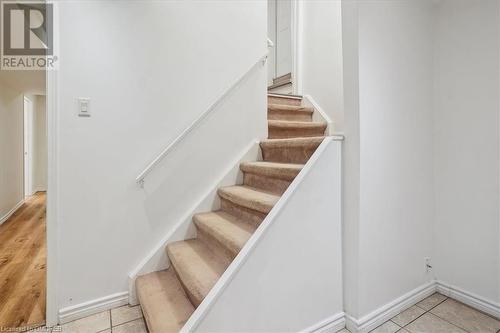 Stairs with tile patterned flooring - 5021 Bunton Crescent, Burlington, ON - Indoor Photo Showing Other Room