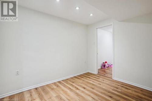 Unfurnished room with light hardwood / wood-style flooring - 5021 Bunton Crescent, Burlington, ON - Indoor Photo Showing Other Room