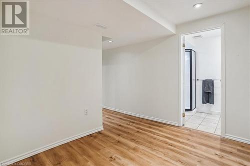 Unfurnished room with light hardwood / wood-style floors - 5021 Bunton Crescent, Burlington, ON - Indoor Photo Showing Other Room