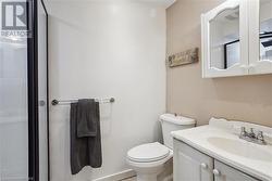 Bathroom featuring vanity and toilet - 