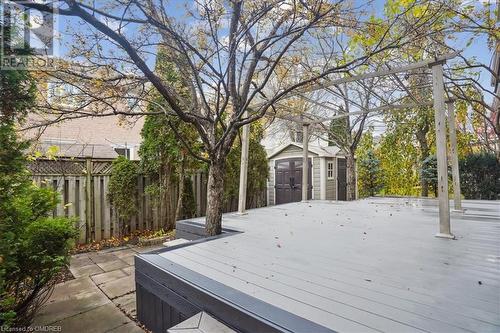 Wooden deck featuring a storage shed - 5021 Bunton Crescent, Burlington, ON - Outdoor