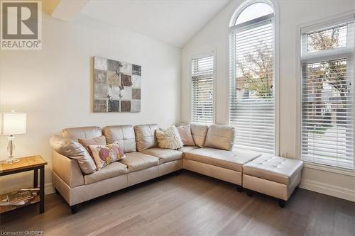 Living room featuring vaulted ceiling and hardwood / wood-style flooring - 5021 Bunton Crescent, Burlington, ON - Indoor Photo Showing Living Room