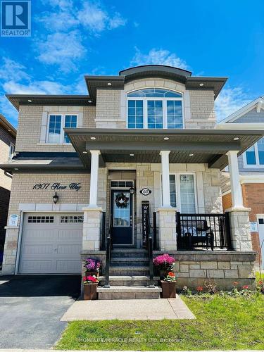 1307 Rose Way, Milton, ON - Outdoor With Facade