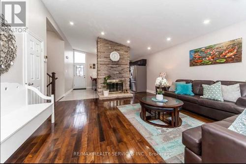 15 Athlone Avenue, Brampton, ON - Indoor Photo Showing Living Room With Fireplace