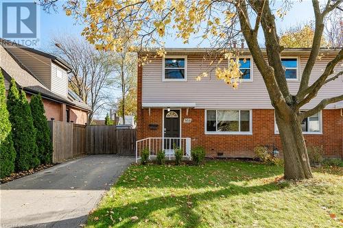 View of front facade with a front lawn - 305 East 24Th Street, Hamilton, ON - Outdoor