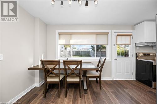 Dining space with dark wood-type flooring - 305 East 24Th Street, Hamilton, ON - Indoor Photo Showing Dining Room