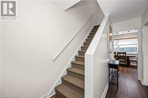 Stairway featuring hardwood / wood-style flooring - 305 East 24Th Street, Hamilton, ON - Indoor Photo Showing Other Room