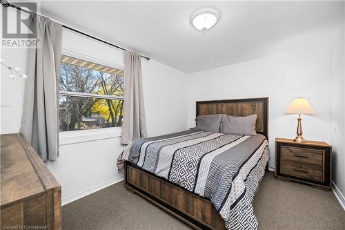 View of carpeted bedroom - 305 East 24Th Street, Hamilton, ON - Indoor Photo Showing Bedroom