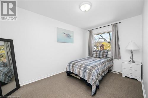 Bedroom with dark carpet - 305 East 24Th Street, Hamilton, ON - Indoor Photo Showing Bedroom