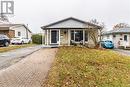 Bungalow-style house with a front lawn and covered porch - 39 Keewatin Avenue, Kitchener, ON  - Outdoor 