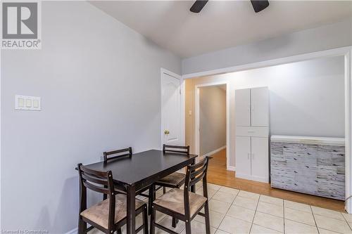 Dining space with ceiling fan and light hardwood / wood-style flooring - 39 Keewatin Avenue, Kitchener, ON - Indoor