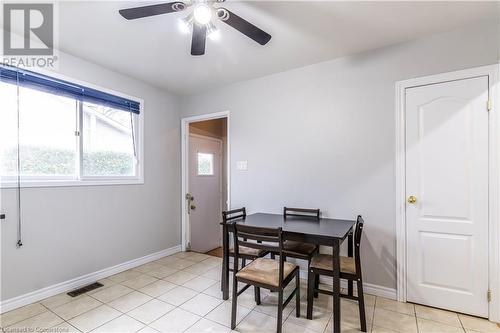 Tiled dining area with ceiling fan - 39 Keewatin Avenue, Kitchener, ON - Indoor