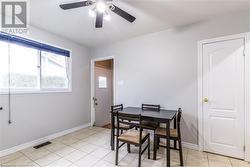 Tiled dining area with ceiling fan - 