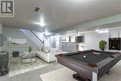 Game room featuring carpet floors and pool table - 