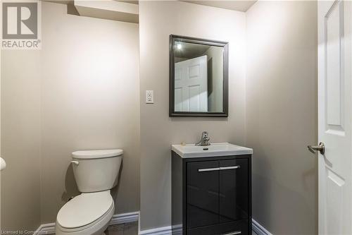 Bathroom featuring vanity and toilet - 39 Keewatin Avenue, Kitchener, ON - Indoor Photo Showing Bathroom