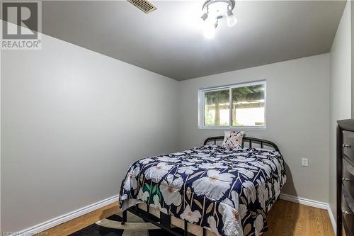 Bedroom featuring hardwood / wood-style floors - 39 Keewatin Avenue, Kitchener, ON - Indoor Photo Showing Bedroom