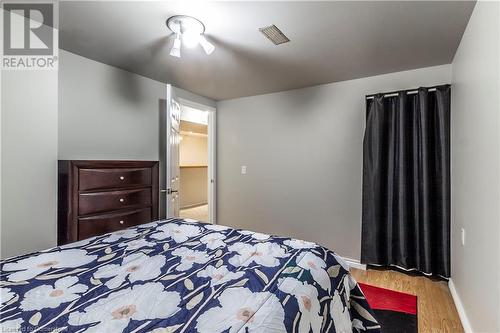 Bedroom with light hardwood / wood-style flooring - 39 Keewatin Avenue, Kitchener, ON - Indoor Photo Showing Bedroom