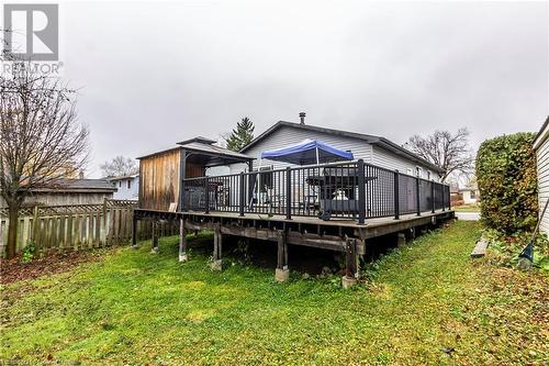 Back of house featuring a deck and a lawn - 39 Keewatin Avenue, Kitchener, ON - Outdoor With Deck Patio Veranda