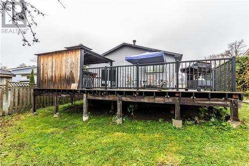 Rear view of house featuring a deck and a yard - 39 Keewatin Avenue, Kitchener, ON - Outdoor With Deck Patio Veranda