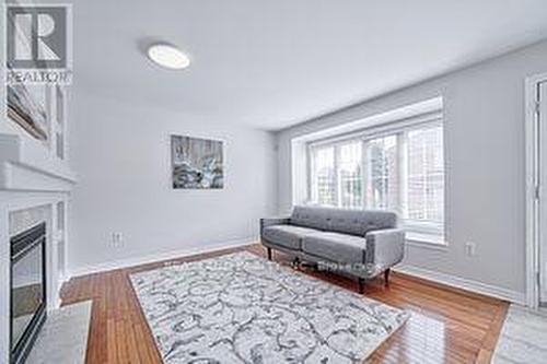 39 Roy Rainey Avenue, Markham, ON - Indoor Photo Showing Living Room With Fireplace