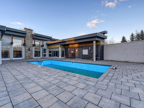 Piscine - 1505-639 Rue Robert-Élie, Laval (Laval-Des-Rapides), QC - Outdoor With In Ground Pool