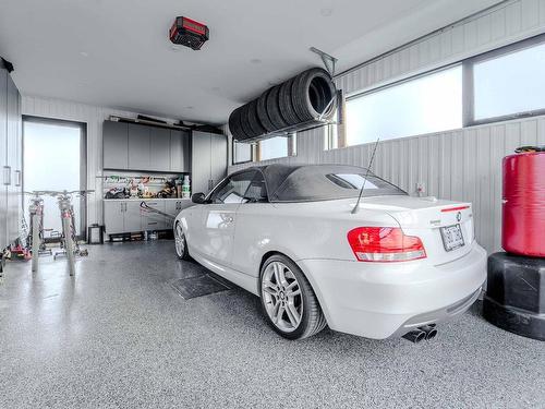 Garage - 138 Ch. De Touraine, Saint-Sauveur, QC - Indoor Photo Showing Garage