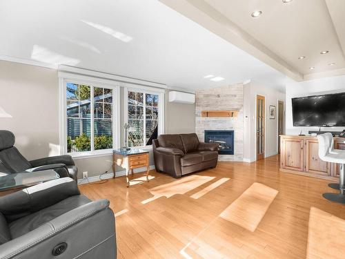 Overall view - 203-2141 Rg De La Rivière, Saint-Isidore, QC - Indoor Photo Showing Living Room With Fireplace