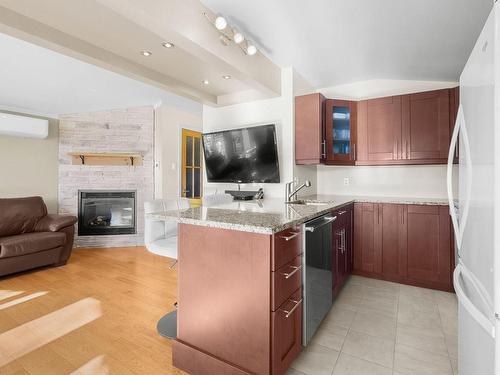 Kitchen - 203-2141 Rg De La Rivière, Saint-Isidore, QC - Indoor Photo Showing Other Room With Fireplace