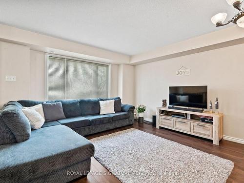 114-4950 Winston Churchill Blvd E, Mississauga, ON - Indoor Photo Showing Living Room