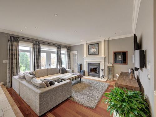 Salon - 8 Rue De Rambouillet, Blainville, QC - Indoor Photo Showing Living Room With Fireplace