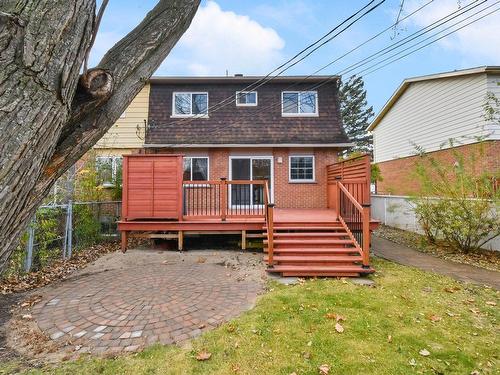 Back facade - 4972 Rue Hortie, Montréal (Pierrefonds-Roxboro), QC - Outdoor With Deck Patio Veranda